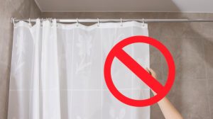 Adeus, cortinas de plástico para casa de banho: uma tendência que está a revolucionar o design de interiores